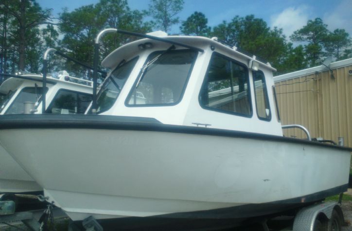 <strong>21 SeaArk 2003 VC Commander</strong>2003 Sea Ark 21' VC Commander with twin 115 Four Stroke outboards